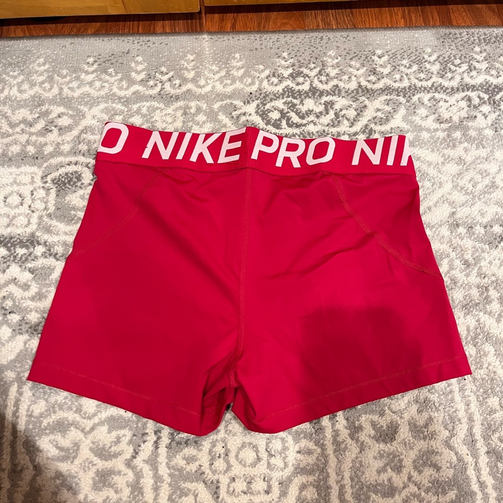 hot pink nike pros
